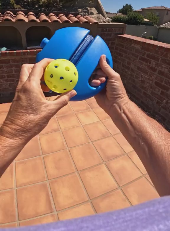 Solo pickleball rebounder trainer in action